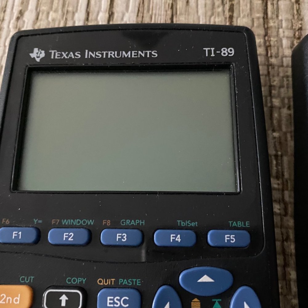 Texas Instruments TI-89 Graphing Math Calculator Black with Hard Slide - Picture 2 of 6